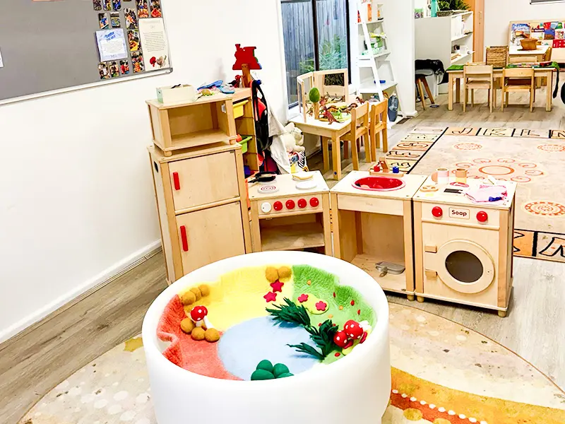 Preschoolers developing fine motor skills through painting, drawing, and messy play